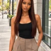 The Boss Belle 24-inch colour 350 straight raw human hair wig, front view on a model.