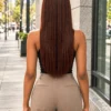 The Boss Belle 24-inch colour 350 straight raw human hair wig, rear view on a model.