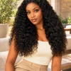 The Burmese Belle 22-inch Natural Black Burmese curls wig, front view on a model.